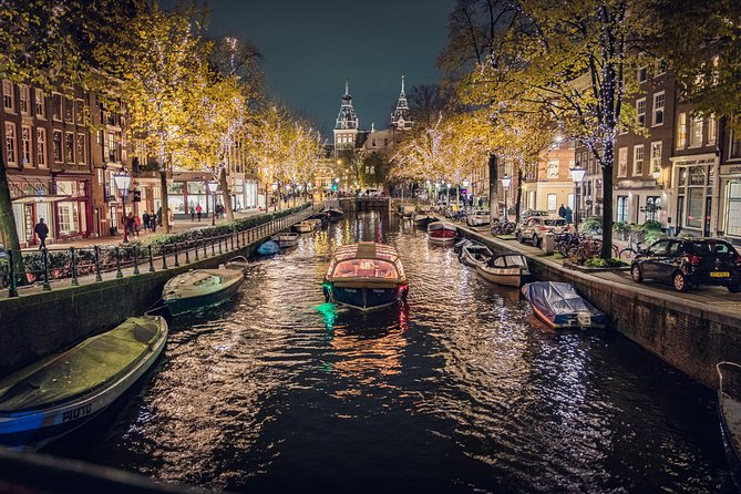 Amsterdam 2-Hour Evening Cruise With Live Guide and Bar - The Stopera and Amsterdam’s mixed emotions