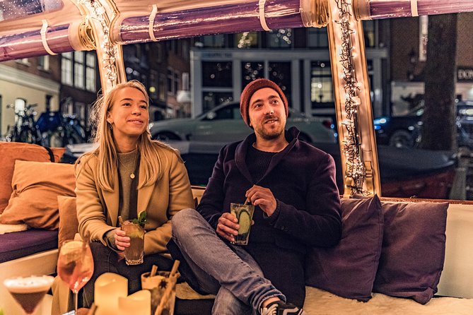 Amsterdam 2-Hour Evening Cruise With Live Guide and Bar - The Anne Frank House and Amsterdam’s churches
