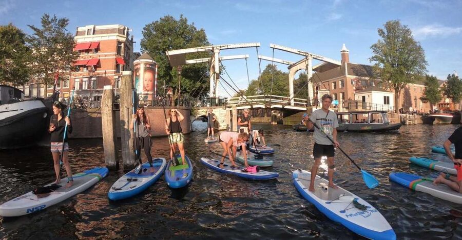 Amsterdam: 2-Hour Stand Up Paddle Board Tour - Crossing the Amstel into the canal center