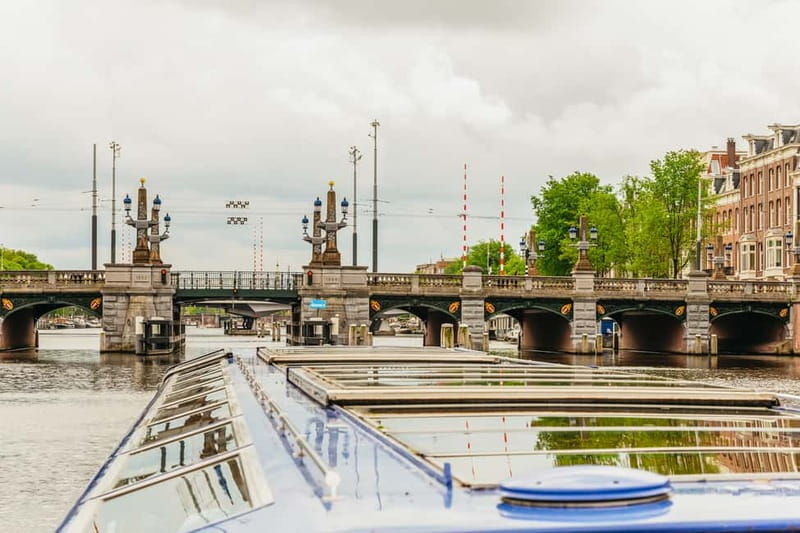 Amsterdam: 75 Minute City Canal Cruise with Audio Guide - Following the route through central Amsterdam