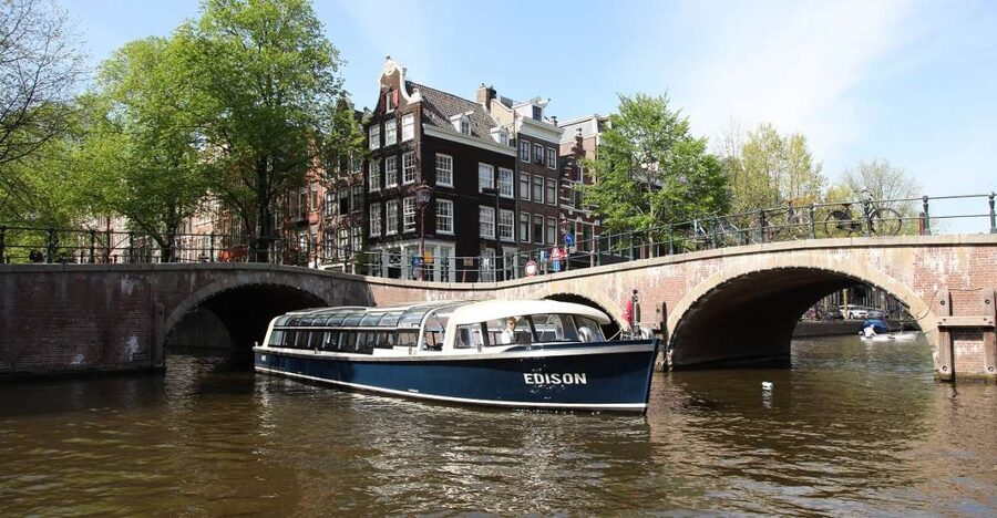 Amsterdam: 75 Minute City Canal Cruise with Audio Guide - Centraal Station, the IJ, and modern Amsterdam