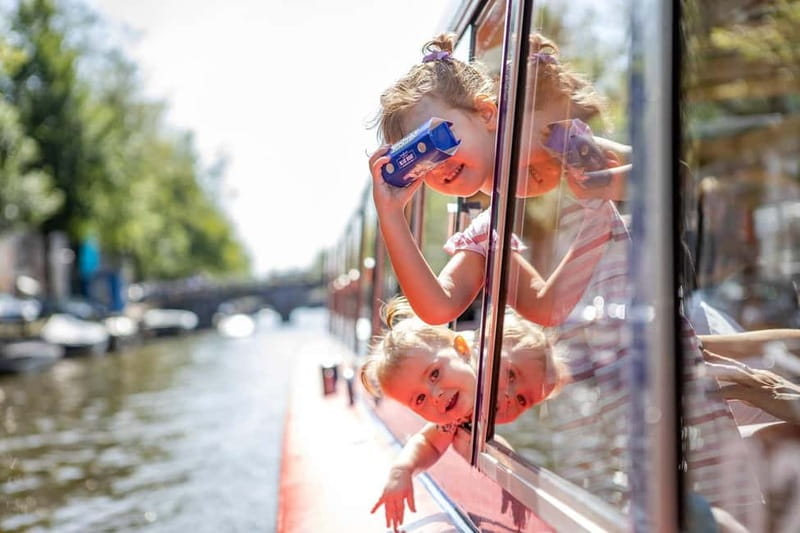 Amsterdam: 75 Minute City Canal Cruise with Audio Guide - Snacks, children, and onboard comfort