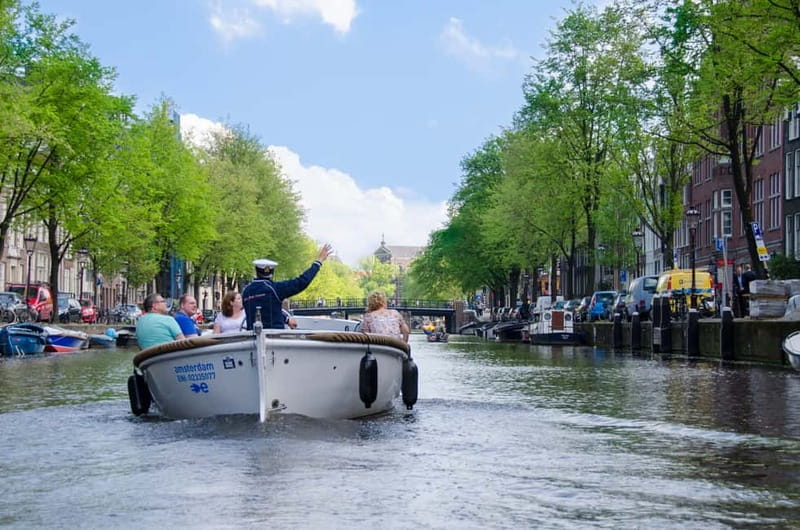 Amsterdam: 75 minute Open Boat Canal Cruise with Live Guide - Why the smaller boat changes the Amsterdam experience
