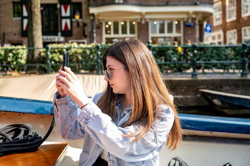 Amsterdam: 75 minute Open Boat Canal Cruise with Live Guide - Museum Quarter, Heineken, Van Gogh, and Rijksmuseum