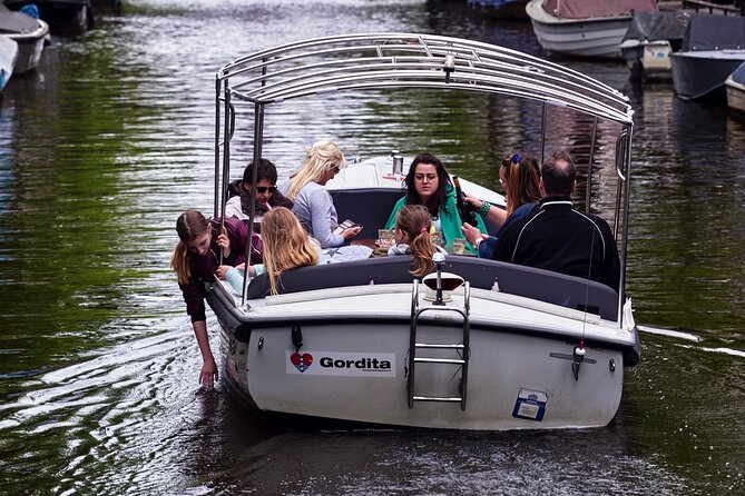 Amsterdam 90-min Private Canal Cruise with Live Guide and Drinks - Herengracht and the Golden Bend