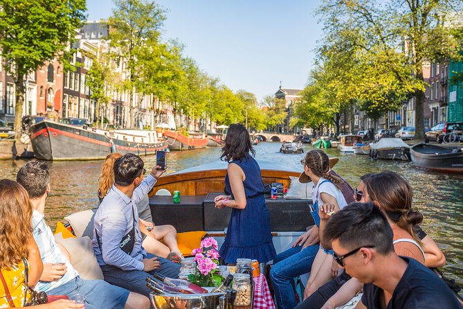 Amsterdam All-Inclusive 90-Minutes Heated Cruise by Captain Jack - Historic churches, markets, and the old center
