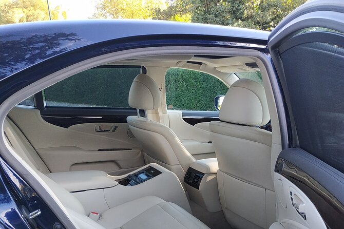 Amsterdam and Countryside Private Full-Day Tour by luxury car - Monnickendam and Marken: Two Different Waterfront Stories