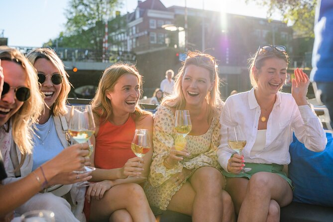 Amsterdam: Canal Booze Cruise with Unlimited Drinks Option - Boat comfort and rainy-day limits