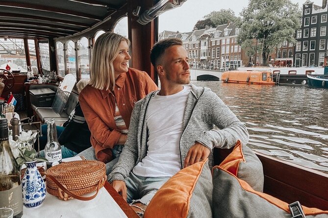 Amsterdam Canal Cruise in Classic Salon Boat With Drinks and Cheese - Night cruises, birthdays, and group expectations