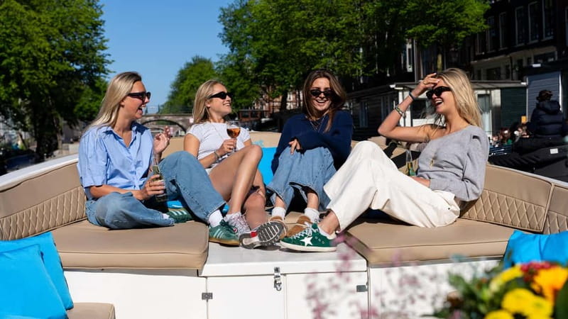 Amsterdam: Canal Cruise in Open Boat with Drink Option - When to go, and how weather changes the experience