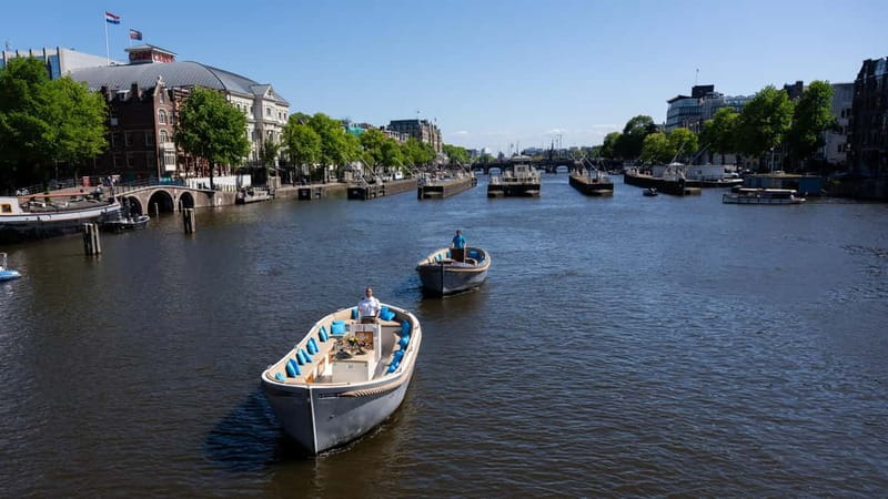 Amsterdam: Canal Cruise in Open Boat with Drink Option - What the open boat feels like on the canals