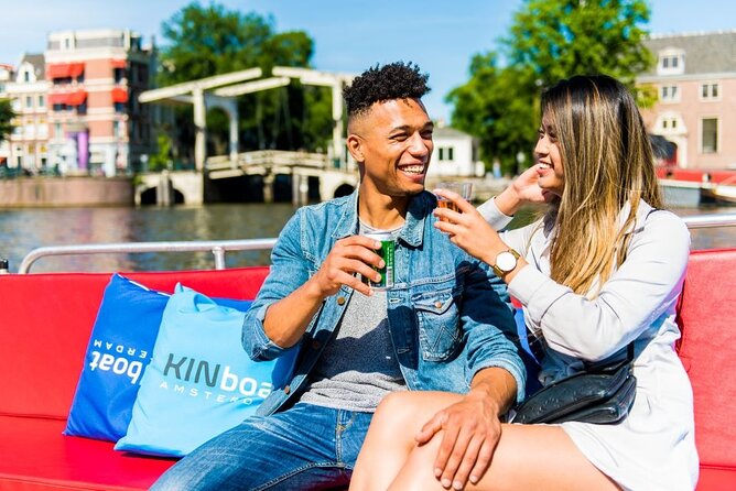 Amsterdam Canal Cruise in Open Boat with Unlimited Drinks Option - From famous museums to quieter waterways