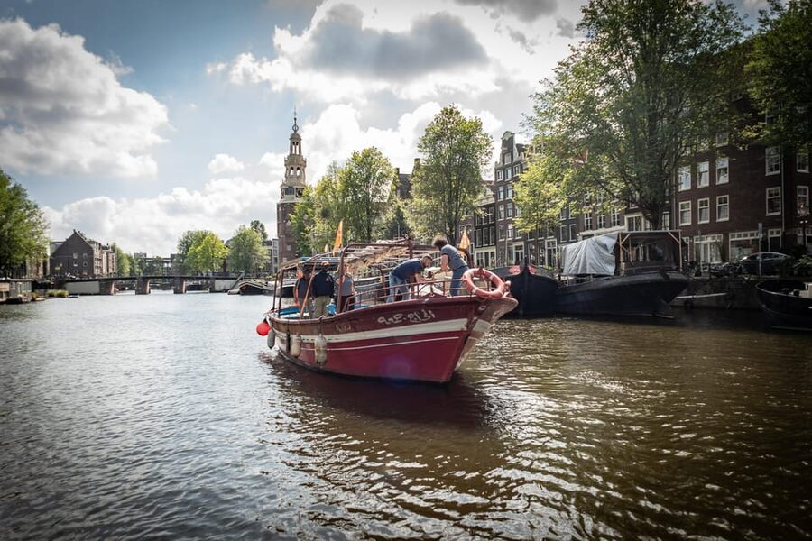 Amsterdam: Canal Cruise on a Wooden Refugee Boat - Why the Amsterdam setting matters