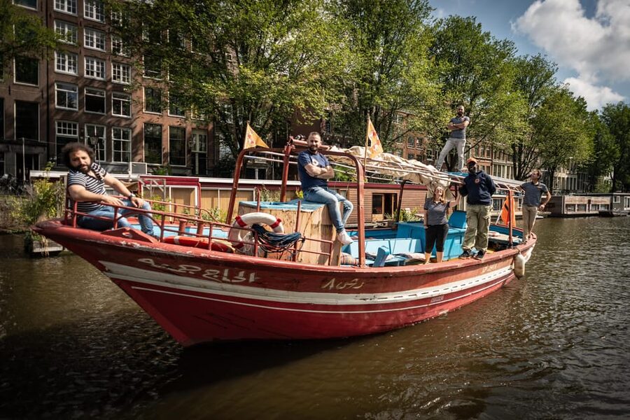 Amsterdam: Canal Cruise on a Wooden Refugee Boat - The Mediamatic meeting point