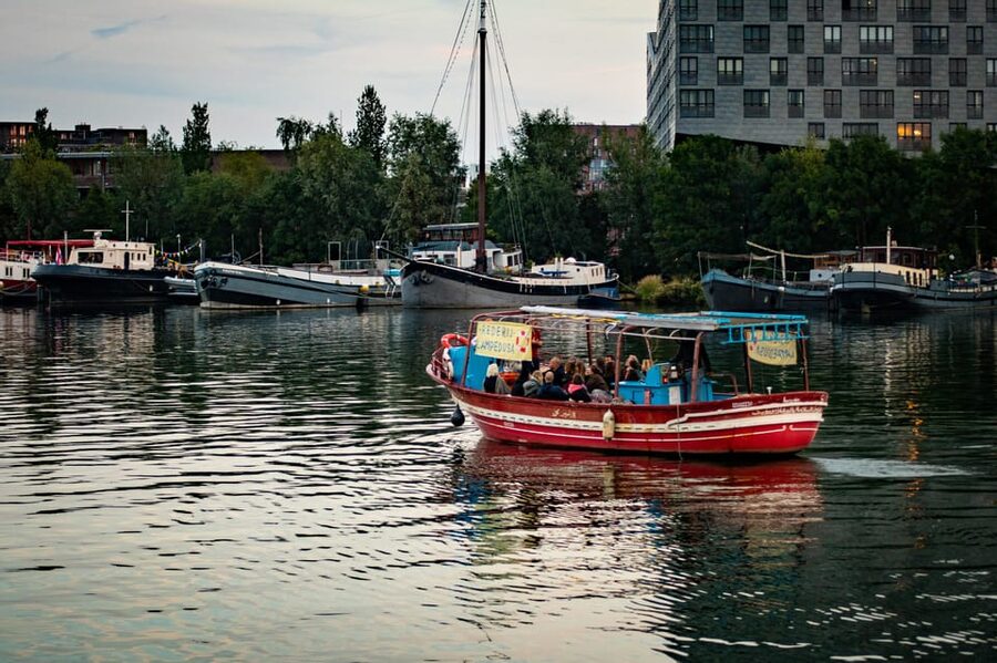 Amsterdam: Canal Cruise on a Wooden Refugee Boat - Weather, comfort, and what to pack