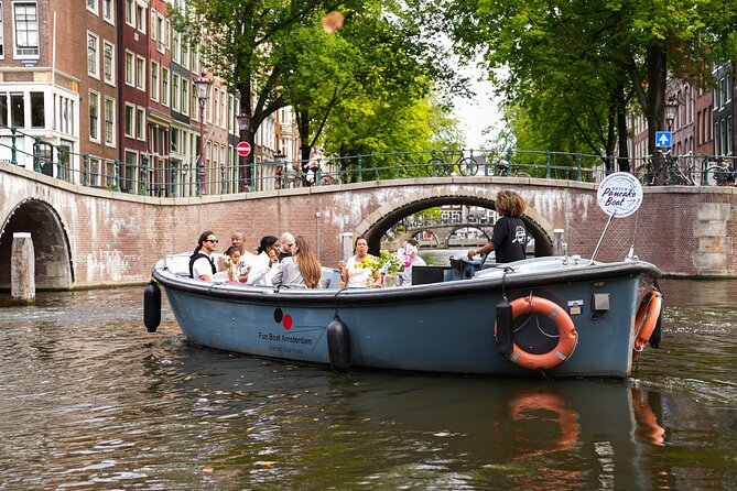 Amsterdam Canal Cruise with Dutch Pancakes and Drinks - Dutch poffertjes, drinks, and the rhythm of the cruise