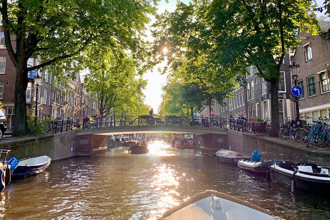 Amsterdam Canal Cruise with German Guide and unlimited drinks - Houseboats and Amsterdam’s slower side