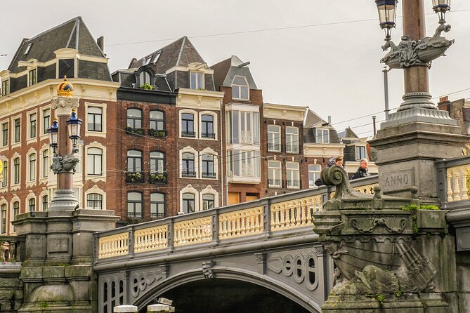 Amsterdam Canal Cruise with German Guide and unlimited drinks - German guides who shape the experience