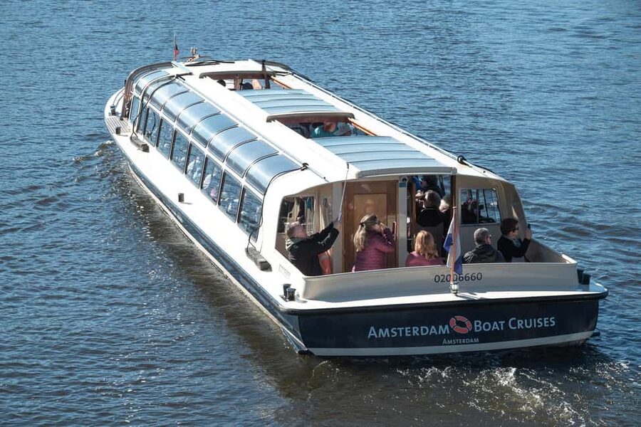 Amsterdam: Canal Cruise with Live Commentary & Audio Guide - The Amstel, central canals, and famous bridges