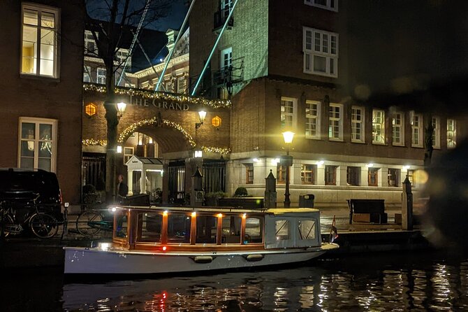 Amsterdam Champagne Private Canal Cruise - Reading the route, one passing view at a time