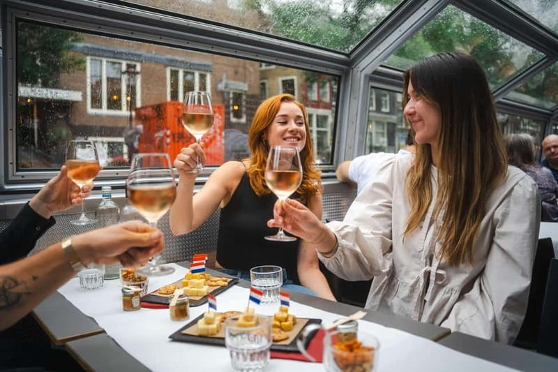 Amsterdam: Cheese & Wine Cruise Tasting Experience - Dutch cheese, salty snacks, and unlimited drinks