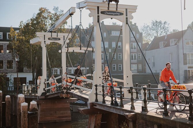 Amsterdam City Top Highlights Guided Bike Tour - Leidseplein and Dam Square