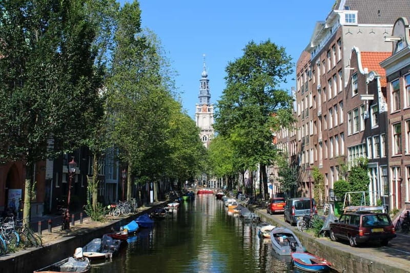 Amsterdam: City walking experience with a local - Starting at Beursplein beside Bistro Berlage