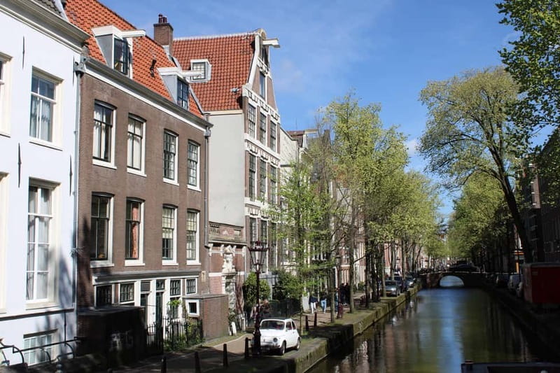 Amsterdam: City walking experience with a local - Nieuwmarkt Square and Amsterdam’s wartime past