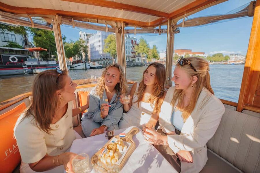Amsterdam: Classic Boat Cruise with Optional Cheese & Wine - The Anne Frank House and Red Light District from the water