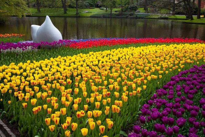 Amsterdam: Day trip to Tulip Farm, Keukenhof + Windmill Cruise - The Kagerplassen windmill cruise