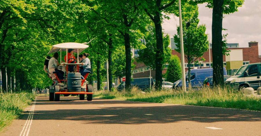 Amsterdam: Dutch Beer Bike Blast Tour with Onboard Bar - Sixty-five minutes through the Sloterdijk district