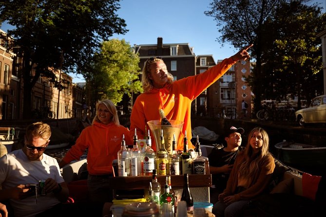 Amsterdam Evening Canal Cruise with Live Guide and Onboard Bar - The Amstel, Magere Brug, and Royal Theatre Carré