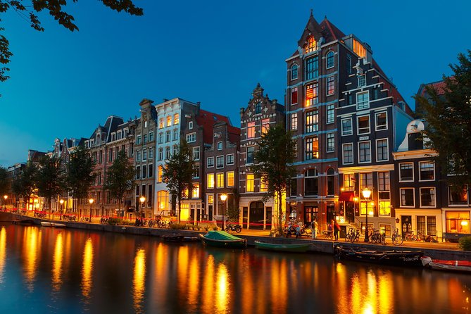 Amsterdam Evening Canal Cruise with Live Guide and Onboard Bar - Munttoren and the city center
