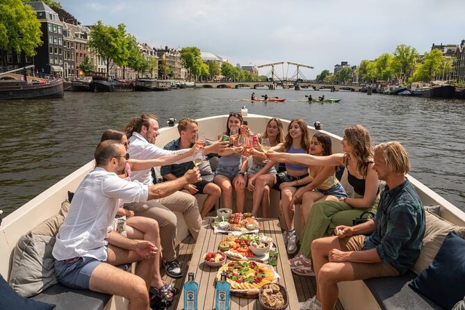 Amsterdam: Evening Candle Light Cruise With Wine & Cheese - The Red Light District from the water