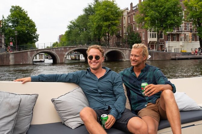 Amsterdam: Evening Candle Light Cruise With Wine & Cheese - Waterlooplein, the Stopera, and the Amstel