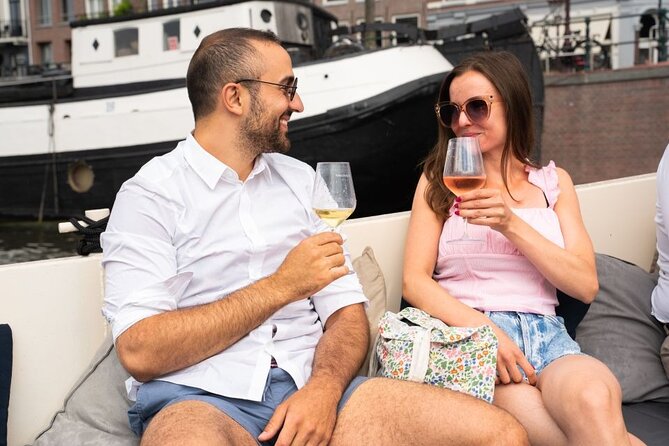 Amsterdam: Evening Candle Light Cruise With Wine & Cheese - Magere Brug after dark
