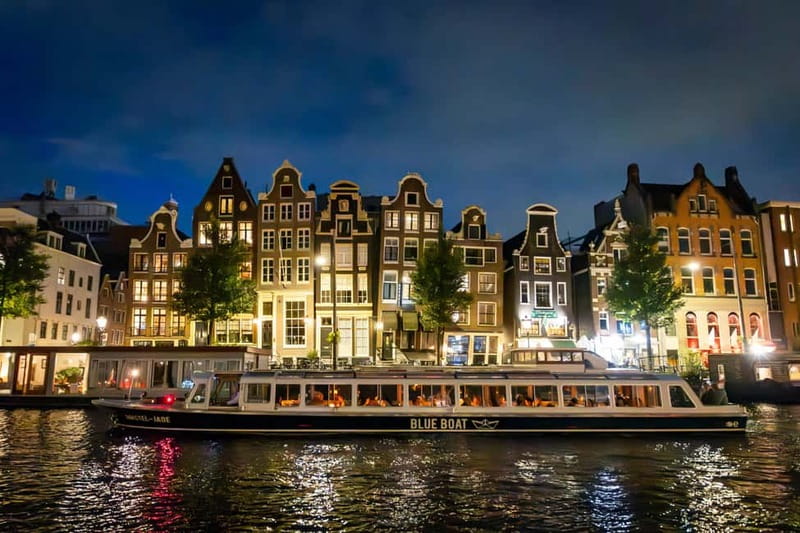 Amsterdam: Evening Cruise with Optional Wine and Snacks - Herenmarkt and Haarlemmersluis: A Quieter Canal Stretch