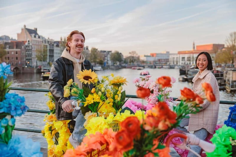 Amsterdam: Explore Canals, Guided Tour on Flower Bikes - Dam Square and the ride back
