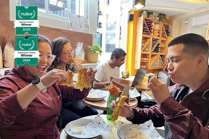 Amsterdam Food and Cultural Tour with Tastings - Begijnhof: a quiet courtyard behind the city noise