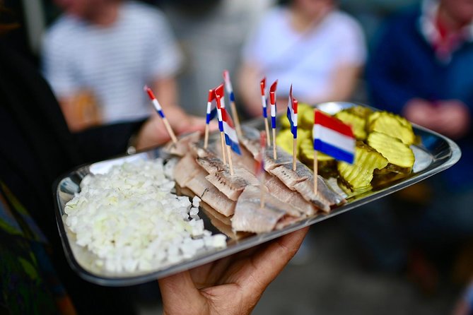 Amsterdam Food Tour of 10+ Local Classic Tastings in Jordaan Area - Dutch cheese, ham, and sausage bring out local habits