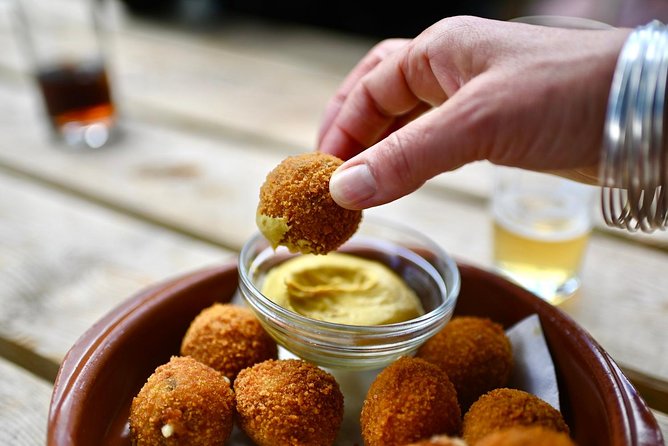 Amsterdam Food Tour of 10+ Local Classic Tastings in Jordaan Area - Apple cake and the secret dish provide a satisfying finish