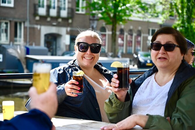 Amsterdam Food Tour of 10+ Local Classic Tastings in Jordaan Area - Landmarks add context between the food stops