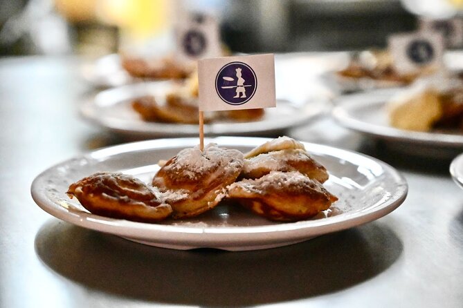 Amsterdam Food Tour of 10+ Local Classic Tastings in Jordaan Area - Poffertjes begin the meal with a sweet Dutch classic