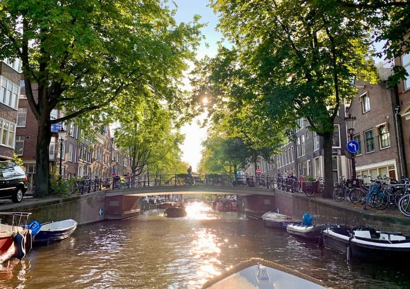 Amsterdam: German Canal Cruise with Unlimited Drinks Option - NEMO and the Maritime Museum at the start