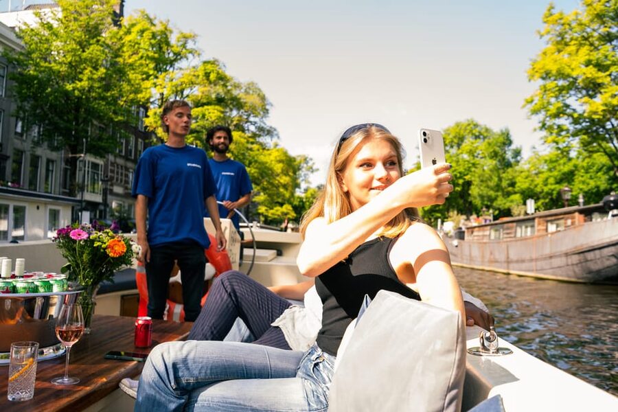Amsterdam: German Guided Canal Cruise with on Board Bar - Maritime Museum, Montelbaanstoren, and Rembrandt’s neighborhood