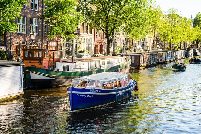 Amsterdam: German-speaking boat trip with bar on board - Why a one-hour canal ride is a smart first look at Amsterdam