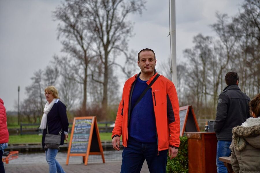 Amsterdam: Giethoorn and Zaanse Schans Windmills Day Tour - The pace, vehicle, and group feel