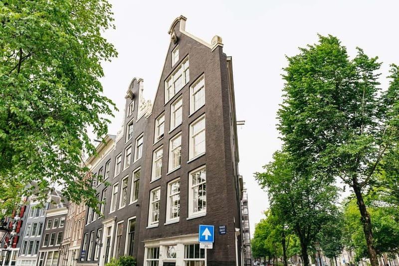 Amsterdam: Guided Bike Tour City Centre in EN/DE/FR/ES - Westerkerk and the Anne Frank House area