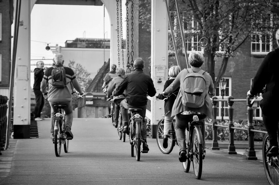Amsterdam: Guided City Bike Tour in French - Magere Brug, the Amstel, and the Jordaan
