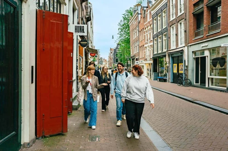 Amsterdam: Guided Cultural Walking Tour - Meeting at Dam Square and finding your guide